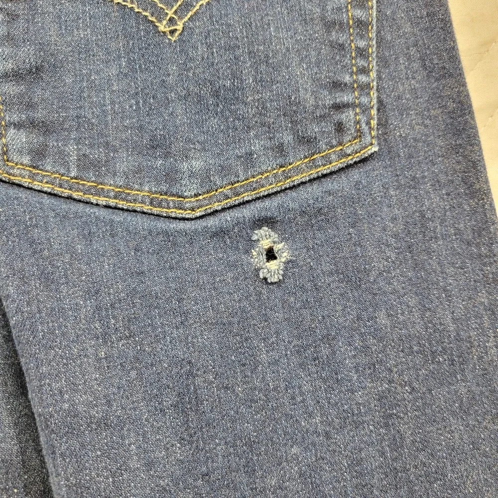 Levis 513 distressed blue jeans size 31X30‎